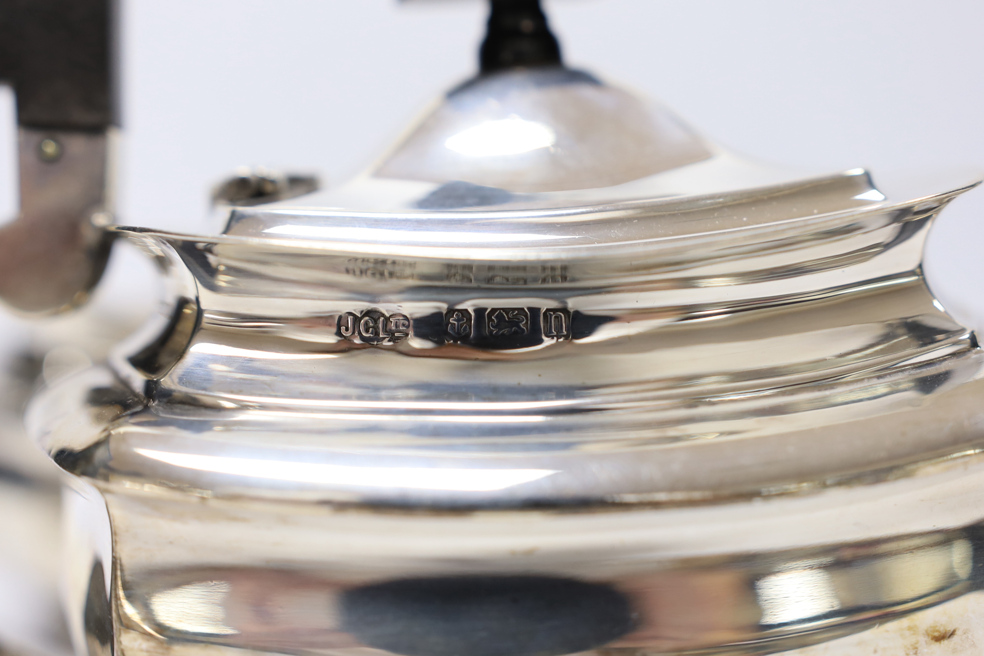 A George V silver three piece tea set, Joseph Gloster Ltd, Birmingham, 1912